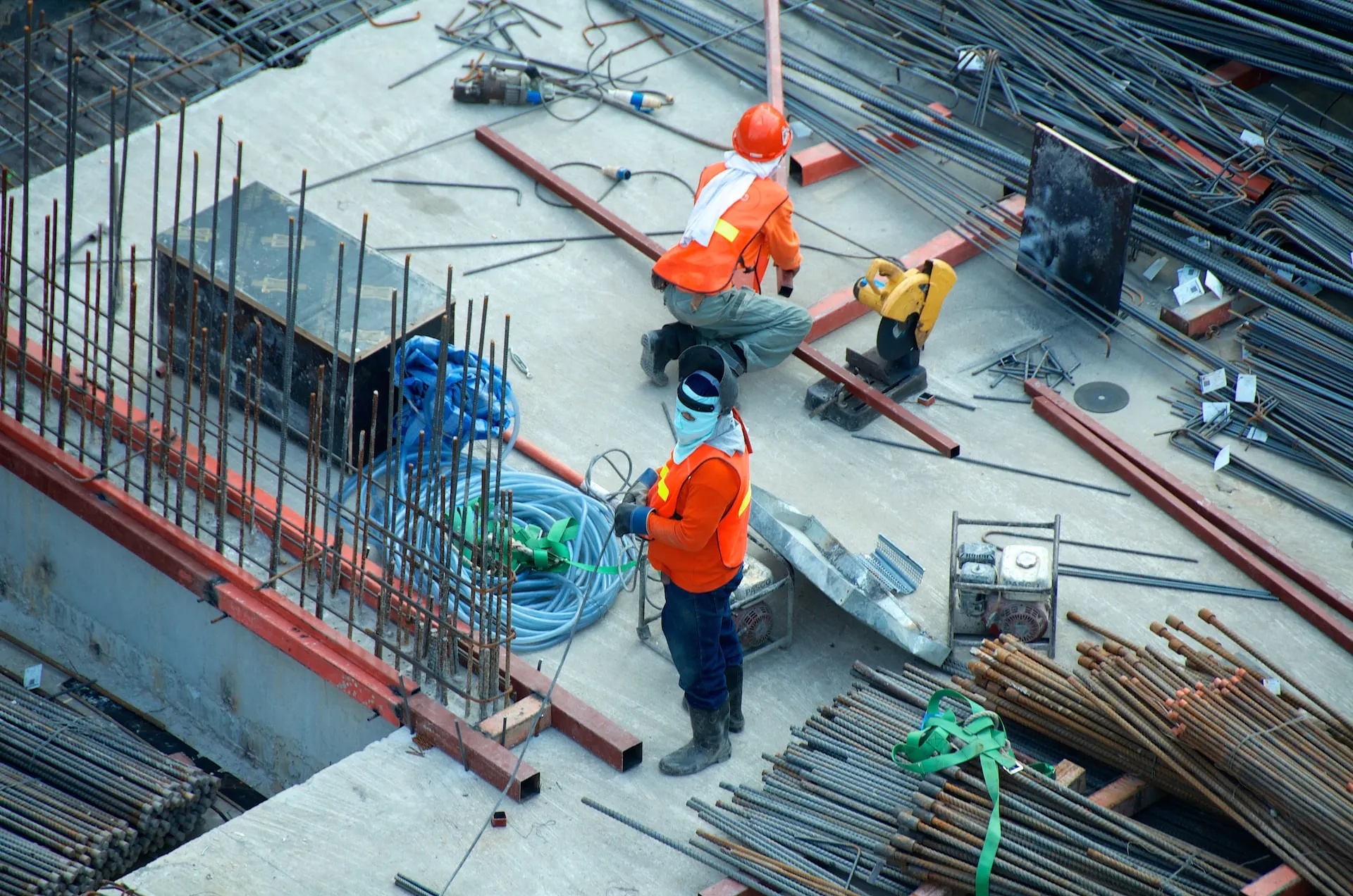 Two men working i a construction site